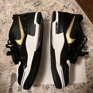 Nike Air Jordan Legacy 312 Low GS 'Black Metallic Gold'